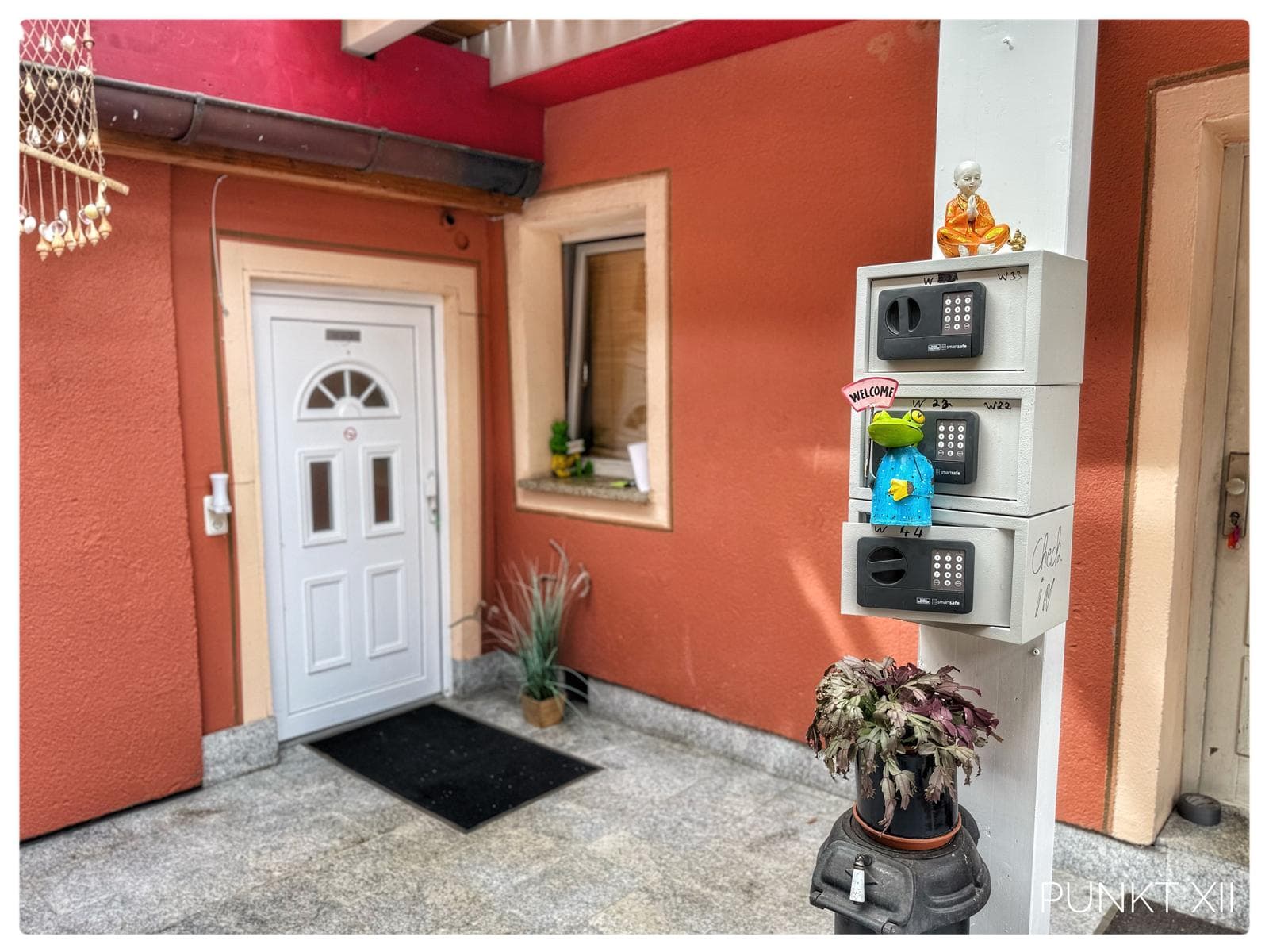 Self check-in: key safes labelled W2, W3 and W4 at the entrance